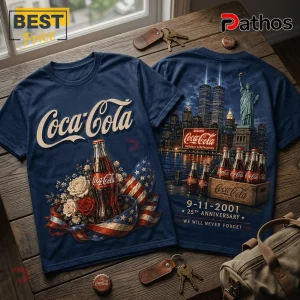 Coca Cola 9-11 25th Anniversary T-Shirt 4 Coca Cola 9-11 25th Anniversary T-Shirt in navy blue featuring vintage soda bottles, American flag, and NYC skyline graphics.