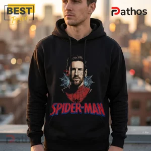 Messi x Spider-Man 2026 Edition Black Hoodie 3 Black hooded sweatshirt featuring a graphic of Lionel Messi wearing a Spider-Man suit with web accents and logo text.!