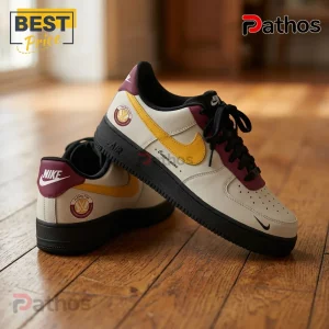 PWHL Hamilton Custom Air Force 1 sneakers featuring white leather, yellow swooshes, burgundy accents, and black soles.
