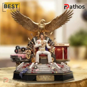 Elvis Presley collectible statue featuring the singer on a throne under a gold eagle with a Vegas stage and pink car.!