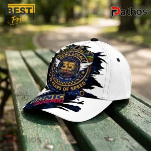 Sonic the Hedgehog 35th anniversary white baseball cap with gold and blue emblem featuring 1991-2026 text on wooden bench.!