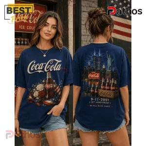 Coca Cola 9-11 25th Anniversary T-Shirt 3 Coca Cola 9-11 25th Anniversary T-Shirt in navy blue featuring a vintage skyline, Statue of Liberty, and glass bottles.