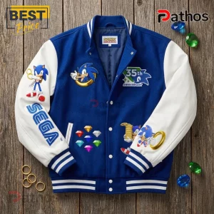 Blue and white Sonic the Hedgehog 35th anniversary varsity jacket featuring embroidered character patches and chaos emeralds.!