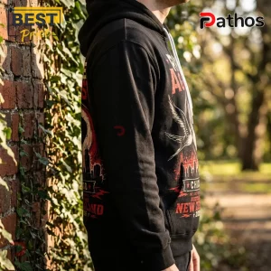 Black hoodie with red and white graphic featuring a swallow bird, Chicago skyline, and text referencing New Zealand.!