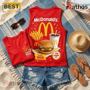 McDonalds 1955 Big Mac and Fries Red V-Neck Tank Top 4 McDonalds 1955 Big Mac and Fries Red V-Neck Tank Top featuring a graphic of a burger, fries, and beverage on fabric.