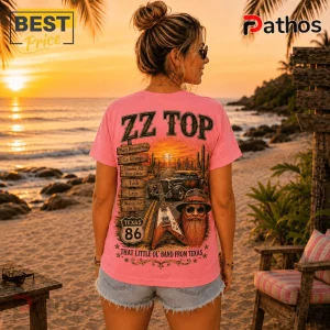 Pink t-shirt with ZZ Top band graphics, classic car, electric guitar, and song titles on a desert highway background.!