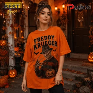 Freddy Krueger Life Is Scarier Orange T-Shirt 3 Freddy Krueger Life Is Scarier Orange T-Shirt featuring a graphic of the horror villain and pumpkins on cotton fabric.