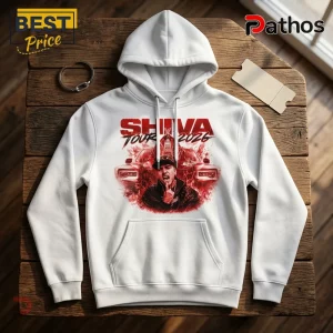 White cotton pullover hoodie featuring a red graphic print of a performer, a car, and text reading SHIVA TOUR 2026.!