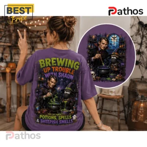 Mads Mikkelsen x Shaun The Sheep Purple Halloween T-Shirt 2 Mads Mikkelsen x Shaun The Sheep purple Halloween t-shirt featuring a witchy graphic print on the back.