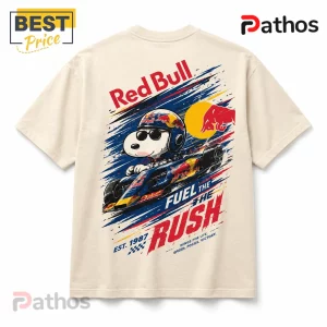 Cream cotton t-shirt with Snoopy in a Red Bull racing car, featuring text Fuel the Rush and Est. 1987 in red and blue.!