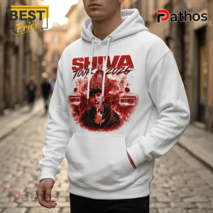 White hoodie with red graphic print featuring text Shiva Tour 2026, a man in a hat, and a luxury car illustration.!
