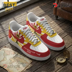 Spain National Team 2026 World Cup AF1 Sneakers 3 Spain National Team 2026 World Cup AF1 sneakers in red, white, and yellow featuring a trophy graphic on wooden flooring.