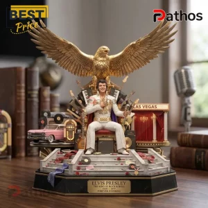 Elvis Presley figurine wearing a white jumpsuit on a stage with a golden eagle, pink car, guitars, and Las Vegas sign.!