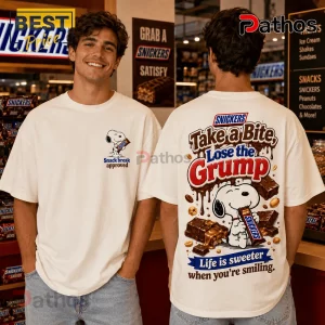 Snoopy x Snickers Snack Break T-Shirt 4 Off-white cotton t-shirt featuring Snoopy holding a Snickers bar with text reading Take a Bite, Lose the Grump on back.!