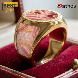 Marilyn Monroe 100th Anniversary Gold Engraved Ring featuring a portrait, pink background, and Happy 100th Birthday text.