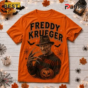 Freddy Krueger Life Is Scarier Orange T-Shirt 1 Freddy Krueger Life Is Scarier Orange T-Shirt featuring a horror villain graphic, pumpkins, bats, and spiderwebs.