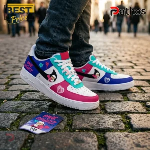 Omar Courtz Por Si Mañana No Estoy Custom Nike Air Force 1 Sneakers 1 Omar Courtz Por Si Mañana No Estoy Custom Nike Air Force 1 sneakers with pink, blue, and teal accents on cobblestones.