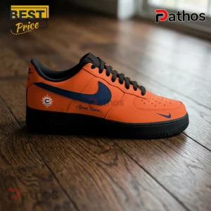 Connecticut Sun Orange Black Nike Air Force 1 Sneakers 1 Custom orange leather sneaker with black midsole, navy swoosh, and Your Name script text on a dark wood floor.!