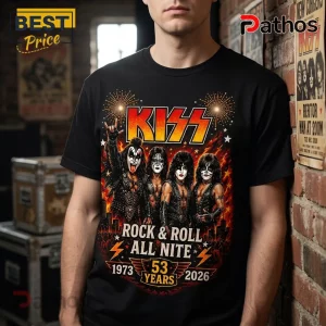 Black cotton t-shirt featuring KISS band members in stage makeup with fire graphics and text reading Rock & Roll All Nite.!