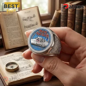 Silver Iron Maiden Aces High ring with blue enamel inlay, Eddie mascot pilot, and diamond accents held in a hand.!