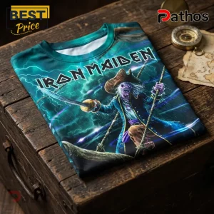 Iron Maiden graphic t-shirt featuring Eddie the Head as a pirate on a wooden surface with a vintage compass.!