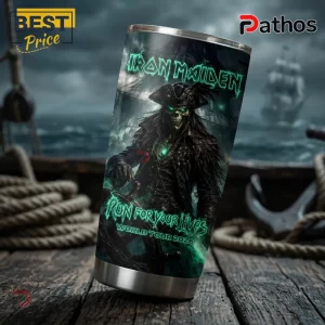 Iron Maiden stainless steel tumbler featuring a pirate skeleton graphic, glowing green text, and metal base.!