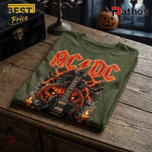 AC/DC High Voltage Pumpkin Skeleton T-Shirt in olive green featuring a carved jack-o'-lantern, electric guitar, and flames.