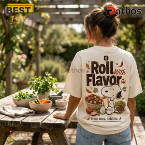 Chipotle x Snoopy Limited Edition Mascot T-Shirt 3 Off-white t-shirt with Snoopy eating a burrito graphic, text reading Roll With Flavor and Fresh bites, bold life.!