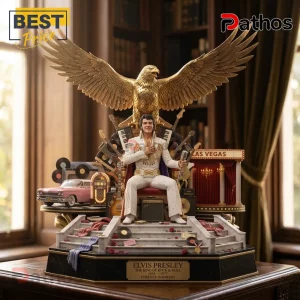 Elvis Presley collectible statue wearing a white jumpsuit, seated under a gold eagle, with musical instruments and Las Vegas.!