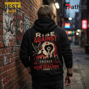 Black hoodie featuring Rise Against text, a bird, clenched fist in a heart, Chicago skyline, and 2026 tour details.!