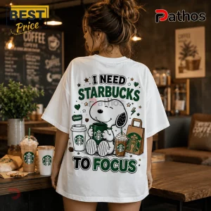 Snoopy Starbucks I Need To Focus T-Shirt 4 Snoopy Starbucks I Need To Focus T-shirt featuring Snoopy holding a green coffee cup on a white cotton backdrop.