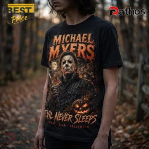Michael Myers Evil Never Sleeps Horror Movie T-Shirt 2 Black cotton t-shirt featuring Michael Myers graphic with orange text reading Michael Myers and Evil Never Sleeps.!