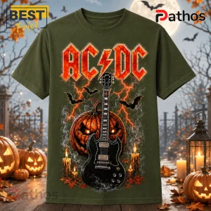 AC/DC High Voltage Pumpkin Skeleton T-Shirt featuring a black electric guitar, glowing jack-o'-lantern, and orange bolts.