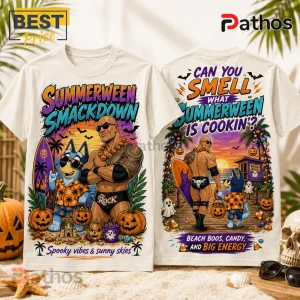 The Rock x Bluey Summerween Beige T-Shirt featuring Dwayne Johnson and Bluey characters on a beach with pumpkins.