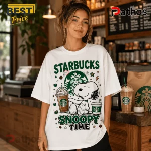 Snoopy Starbucks I Need To Focus T-Shirt 3 Snoopy Starbucks I Need To Focus T-Shirt featuring a cartoon Snoopy graphic, iced coffee, and green text on white fabric.