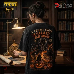 Black vintage-wash t-shirt featuring Darth Vader skull, glowing orange pumpkins, and text A Fright From A Galaxy Far Away.!