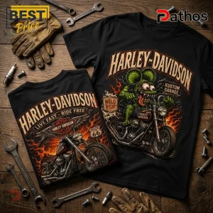 Harley-Davidson Kustom Garage Rat Fink Black T-Shirt with stylized green rodent character riding a motorcycle on wood.