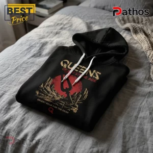 Queens of the Stone Age Desert Rock Australia Tour 2026 Hoodie 2 Black cotton hoodie featuring Queens of the Stone Age band graphics, red desert sun, and white drawstrings on a grey bed.!