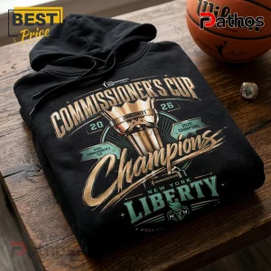New York Liberty 2026 Commissioner's Cup Champions Black Hoodie 1 Black cotton hoodie featuring gold and teal New York Liberty 2026 Commissioner's Cup champion trophy graphic print.!