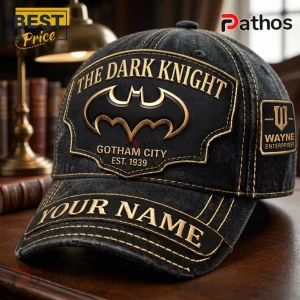 Batman The Dark Knight Gotham City personalized black cap with gold embroidered text and a Wayne Enterprises side patch.