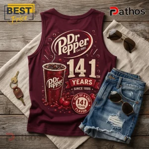 Dr Pepper 141 Years Anniversary Burgundy V-Neck Tank Top 1 Dr Pepper 141 Years Anniversary burgundy V-neck tank top featuring a soda glass graphic and 141 text on wood background.