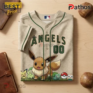 Los Angeles Angels Pokemon Pikachu Eevee Custom Baseball Jersey 1 Tan button-up baseball jersey featuring Eevee and other Pokémon graphics, green trim, and Angels text with the number 00.!