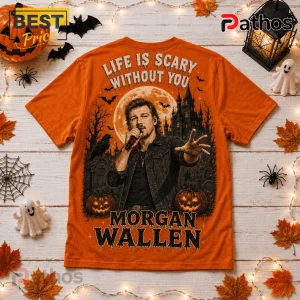 Morgan Wallen Spooky Season T-Shirt 2026 featuring a singer graphic, moon, haunted castle, and pumpkins on orange fabric.
