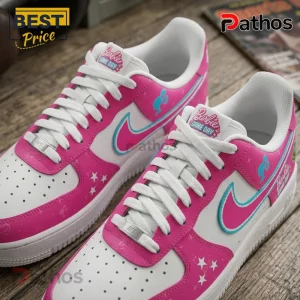 Barbie x Seattle Storm Air Force 1 Custom Sneakers 1 Barbie x Seattle Storm Air Force 1 custom sneakers featuring pink and white leather with teal swooshes and star motifs.