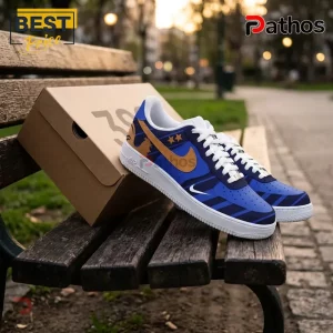 France Soccer World Cup 2026 Blue Custom AF1 Sneakers 1 Custom blue and gold sneakers with star graphics on a cardboard shoe box resting on a wooden park bench.!