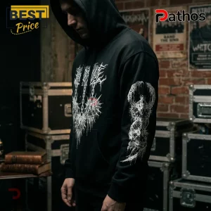 Lorna Shore Australia 2026 Limited Edition Black Hoodie 3 Man wearing a black pullover hoodie with white death metal band logo and spiky chain graphic on chest and left sleeve.!