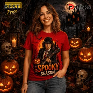AC/DC Spooky Season Halloween Red T-Shirt 3 AC/DC Spooky Season Halloween red t-shirt featuring Angus Young graphic, jack-o'-lanterns, skulls, and full moon background.