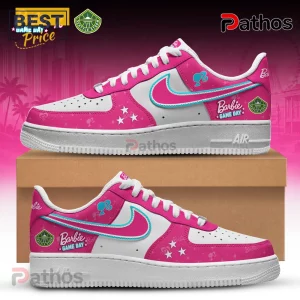 Barbie x Seattle Storm Air Force 1 custom sneakers featuring pink and white panels with team logos and brand graphics.