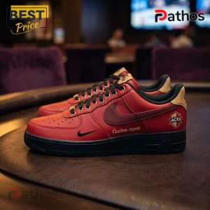 Custom red leather sneakers with black soles, gold Aces shield emblem, and embroidered Custom name text on side panel.!