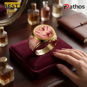 Marilyn Monroe 100th Anniversary Gold Engraved Ring featuring a portrait on a deep red velvet display cushion.